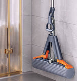 Black self-wringing sponge mop, Australian household mop, floor cleaning tool, comfortable mop, durable sponge mop, spill cleaning, timber floor mop