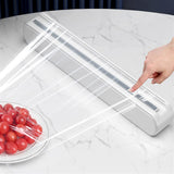 Plastic Wrap Dispenser with Cutter,Suction Cup Type Preservative Film Cutter Plastic Wrap Cutter Adjustable Storage Cutting Box