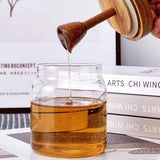 Honey jar glass rack dispenser set for home kitchen, with wooden stick and lid, transparent modern honey syrup glass container, used for storing gifts, In Australia - Darrahopens