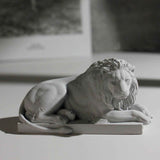 Classic Reclining Lion Sculpture Minimalist Grey Plaster Desk Ornament for Living Room, Study, or Office Decoration