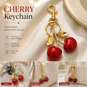 Elegant Red Cherry Bag Charm with double golden leaves, holding lovely little luck to accompany your trips out In Australia - Darrahopens
