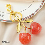 Delicate Pink Cherry Keychain with twin gold leaves, adding soft romantic glow to every bag you carry In Australia - Darrahopens