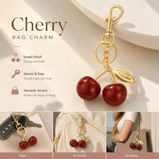 Tiny Fresh Red Cherry Bag Pendant with solo gold leaf, cute subtle surprises waiting in your daily routine