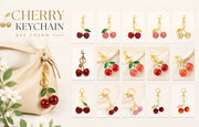Tiny bubble pink cherry keyring decorated with golden leaves, creating light refreshing cheerful atmosphere all around
