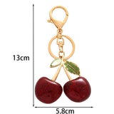 Shiny red cherry bag pendant with green rhinestone leaves, bright lovely radiance lifts your ordinary days In Australia - Darrahopens