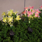 Seven Branch Solar Lily Light: Charges during the day, glows at night. Seven lilies bloom together, soft light flows like water through your garden./white