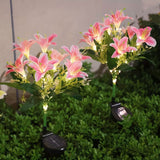 Seven Branch Solar Lily Light: Charges during the day, glows at night. Seven lilies bloom together, soft light flows like water through your garden./white