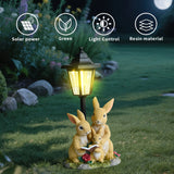 Solar Simulation Rabbit Ornament, charges by day and lights up automatically at night, three rabbits cluster around a street lamp with "WELCOME" bucket, warmly decorates courtyard and balcony, eco-friendly and healing./Rabbit's Kin