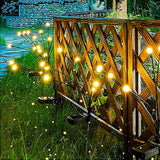 Seven Branch Solar Lily Light: Charges during the day, glows at night. Seven lilies bloom together, soft light flows like water through your garden./10 lamp holder [warm light] is always on
