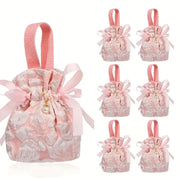 10PCS Pink Jacquard Drawstring Gift Bags – Satin Ribbon Bow with Pearl Pendant, Sweet & Romantic, Perfect for Gifting and Storage Alike.