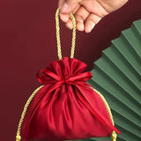 12PCS Red & Gold Drawstring Tassel Tote Bags – Exquisite & Festive, Perfect for Gift Wrapping and Holiday Decorations Alike.