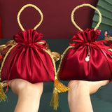 12PCS Red & Gold Drawstring Tassel Tote Bags – Exquisite & Festive, Perfect for Gift Wrapping and Holiday Decorations Alike.