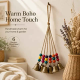 Handmade Bohemian Wind Chime, featuring jute rope with brass bells and colorful wooden beads, rings melodiously in the gentle breeze, adding natural romance to your home. In Australia - Darrahopens
