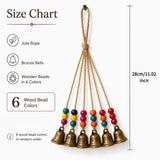 Handmade Bohemian Wind Chime, featuring jute rope with brass bells and colorful wooden beads, rings melodiously in the gentle breeze, adding natural romance to your home.