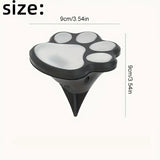 4PCS Dog Paw Solar Ground Light: Realistic paw print design, solar powered, auto on at night. Add warmth and charm to your garden pathway./white light