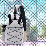 Features a dedicated paddle sleeve and a spacious main storage compartment for clothes, shoes, or gear.BLACK