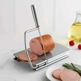 Stainless steel multi-function slicer, precise for even slicing, silicone suction cup for anti-slip stability, sharp blade for smooth cutting, a practical kitchen and baking tool