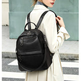 Lychee-grain leather backpack: wear-resistant, large capacity, casual travel & commute, multiple carry ways, zipper anti-theft, premium texture.(grey)