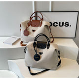 【Canvas Large-Capacity Tote Bag】 Faux Leather Trim Triangular Nameplate, Hidden Magnetic Snap Smooth Zipper, Multi-Way Wear Versatile for Commuting & Travel, Lightweight Storage./black