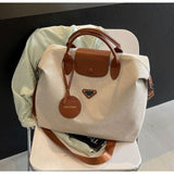 【Canvas Large-Capacity Tote Bag】 Faux Leather Trim Triangular Nameplate, Hidden Magnetic Snap Smooth Zipper, Multi-Way Wear Versatile for Commuting & Travel, Lightweight Storage./black