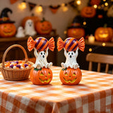 Halloween Resin Ghost Pumpkin Figurine: Little Ghost Sitting on Pumpkin with Candy on Head, Vintage Distressed Finish, Cute and Full of Character, Perfect for Desktops and Party Vibes.Ghost candy pumpkin-old style