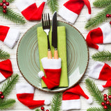 Christmas Decoration 16-Piece Set: Festive Chair Covers and Mini Santa Hat Utensil Sleeves for Holiday Dinner Parties, Table Decor, and Wine Bottle Accents (Red)