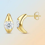 Elevate your everyday elegance with these luxurious moissanite drop earrings, featuring brilliant round-cut stones in a radiant gold setting. Designed for versatile wear, they effortlessly transition from chic daily office attire to refined formal occasio