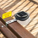 Solar Powered Fence Light with Durable ABS+PC Housing, Monocrystalline Silicon Panel, and Adjustable Mounting Clip for Outdoor Garden, Patio, Deck, and Walkway Illumination in Warm White or Cool White (4PCS, Black Housing‑Cool White Light)