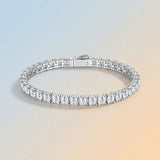 Elevate your everyday elegance with a Square Moissanite Tennis Bracelet in Sterling Silver, featuring 38 brilliant-cut stones with unmatched fire and sparkle. Perfect for daily wear, formal events, and gifting, this luxury accessory combines durability wi