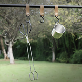 Long, sturdy, and heat-resistant charcoal tongs for grilling food. Made of stainless steel, these portable tongs are suitable for outdoor grilling, charcoal, and fire pits.