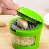 Kitchen Innovations Garlic Press, Crusher, Cutter, Mincer, and Storage Container - Includes Silicone Garlic Peeler - Easy to Clean