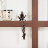 Contemporary Metal Shelf Décor - Bronze Sculpture - Man Lifting Woman from Ledge Handcrafted using the sand casting method