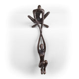 Contemporary Metal Shelf Décor - Bronze Sculpture - Man Lifting Woman from Ledge Handcrafted using the sand casting method