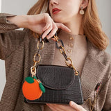 Mini Fruit Keychain Pouch Perfect for Backpacks, Purses, and Daily Carry Essentials (Orange)