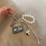 Blue Mini PU Leather Bag Charm Keychain with Pearl Bow Pendant Cute Handbag Accessories for Women Girls, Fashion Decorative Key Ring Hanging Ornament Gift In Australia - Darrahopens