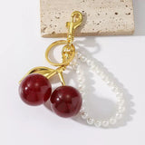 Cute Cherry Bag Charm Keychain with Faux Pearl Strap - Creative Resin Red Cherry Pendant Key Ring Accessory for Women’s Handbags, Purses & Backpacks