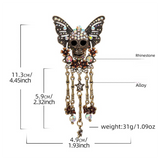 Gothic Skull Butterfly Brooch with Tassel - Vintage Rhinestone Skeleton Pin with Dangling Charms, Dark Aesthetic Statement Badge for Coat Sweater, 11.3cm
