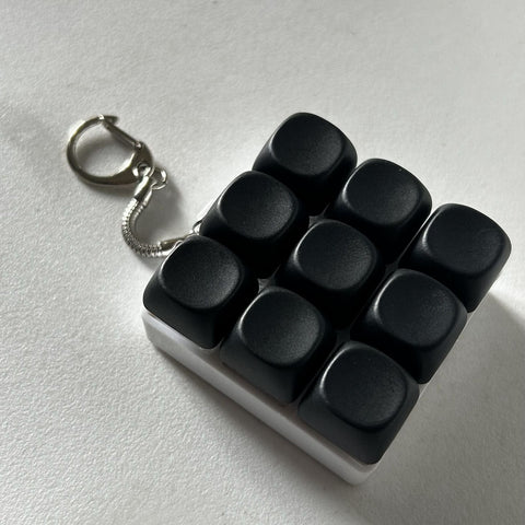 Darrahopens Baby & Kids > Baby & Kid's Toys > Activity Toys 2-Pack Black Mechanical 9-Keyboard Fingertip Toy Keychain - Key Pressure Relief, PVC Fingertip Toy