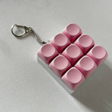Darrahopens Baby & Kids > Baby & Kid's Toys > Activity Toys 2-Pack Dark Pink Mechanical 9-Keyboard Fingertip Toy Keychain - Key Pressure Relief, PVC Fingertip Toy