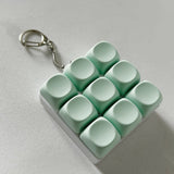 Darrahopens Baby & Kids > Baby & Kid's Toys > Activity Toys 2-Pack Green Mechanical 9-Keyboard Fingertip Toy Keychain - Key Pressure Relief, PVC Fingertip Toy