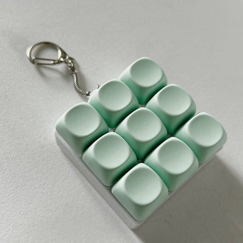 Darrahopens Baby & Kids > Baby & Kid's Toys > Activity Toys 2-Pack Green Mechanical 9-Keyboard Fingertip Toy Keychain - Key Pressure Relief, PVC Fingertip Toy