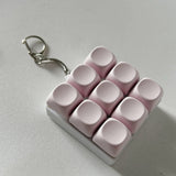 Darrahopens Baby & Kids > Baby & Kid's Toys > Activity Toys 2-Pack Light Pink Mechanical 9-Keyboard Fingertip Toy Keychain - Key Pressure Relief, PVC Fingertip Toy