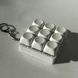 Darrahopens Baby & Kids > Baby & Kid's Toys > Activity Toys 2-Pack White Mechanical 9-Keyboard Fingertip Toy Keychain - Key Pressure Relief, PVC Fingertip Toy
