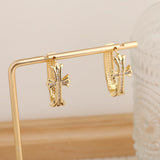 Darrahopens Fashion > Women's Fashion > Women's Accessories 1-Pair Gold Sparkling Iced Out Rhinestone Cross Hoop Earrings - Punk Elegance Ear Buckle for Women