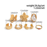 Darrahopens Fashion > Women's Fashion > Women's Accessories 7-Piece Molten Gold Tone Ring Set - Baroque Faux Pearl, Flower, Chain Link & Abstract Shield Bands - Ultimate Adjustable Boho Stackable Jewellery