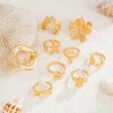 Darrahopens Fashion > Women's Fashion > Women's Accessories 9-Piece Pale Gold Ocean-Inspired Stackable Ring Set - Metal Sea Turtle Starfish Floral Adjustable Open Finger Jewelry for Women