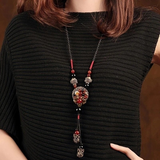 Darrahopens Fashion > Women's Fashion > Women's Accessories Bohemian style long necklace featuring retro beads and metal carved flowers with elegant dangling tassels adjustable 86cm chain suitable for pairing with sweaters and dresses perfect for daily wear or holiday occasions