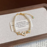 Darrahopens Fashion > Women's Fashion > Women's Accessories Pearl Flower Bracelet for Women – Adjustable Faux Pearl Beaded Bracelet with Gold Floral Charm, Elegant Lightweight Fashion Wrist Jewellery, Gift Box Included, Bridal, Birthday & Everyday Wear In Australia - Darrahopens