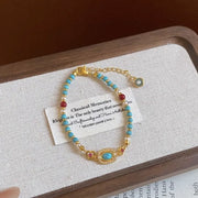 Darrahopens Fashion > Women's Fashion > Women's Accessories Turquoise Beaded Bracelet for Women – Adjustable Vintage Boho Bracelet with Gold-Tone Oval Charm, Turquoise & Pearl Beads, Lightweight Bohemian Wrist Jewellery In Australia - Darrahopens