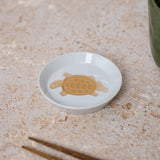 Darrahopens Furniture > Living Room > Ottomans & Footstools Sauce Dish Silhouette Tortoise